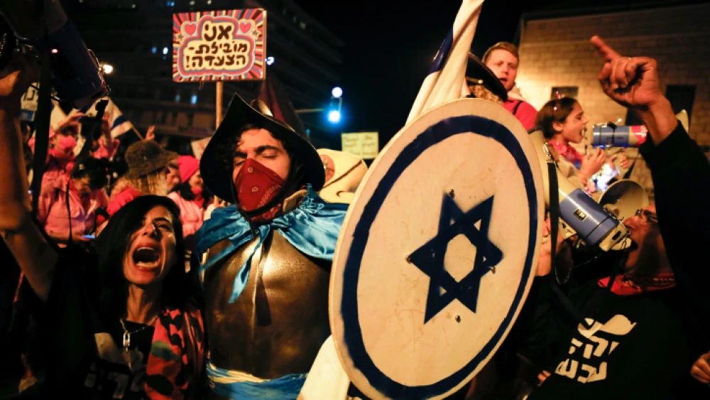 Israelis protest against Israeli Prime Minister Benjamin Netanyahu, near the Prime Minister's Residence in Jerusalem on March 13, 2021. Photo by Olivier Fitoussi/Flash90.