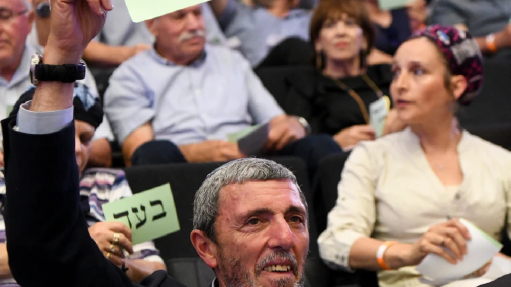 Rafi Peretz, Israel's education minister and leader of the Jewish Home Party, votes on the list of candidates for the upcoming elections at a gathering of the party in Ramat Gan, June 19, 2019. Photo by Yehuda Haim/Flash90.