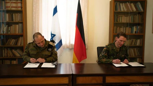 Maj. Gen. Nadav Lotan, head of the IDF Ground Forces, and German Army Commander Lt. Gen. Christian Freuding sign a cooperation agreement in Israel, Feb. 20, 2026. Credit: IDF.