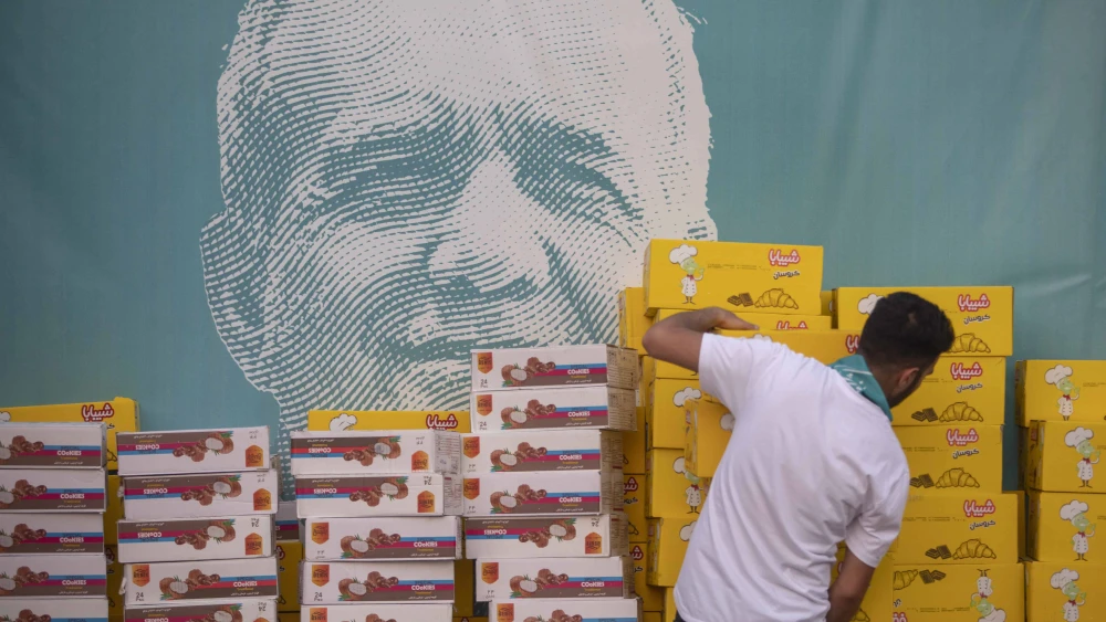Supporters of reformist Iranian presidential candidate Masoud Pezeshkian attend a campaign rally in Tehran, Iran, July 3, 2024. Photo by Majid Saeedi/Getty Images.