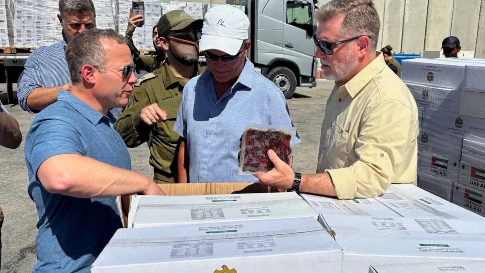 Reps. Josh Gottheimer (D-N.J.), Rick Crawford (R-Ark.) and Ronny Jackson (R-Texas) visit the Kerem Shalom humanitarian aid staging site on the border with Gaza, 6 August, 2025. Photo: Courtesy.