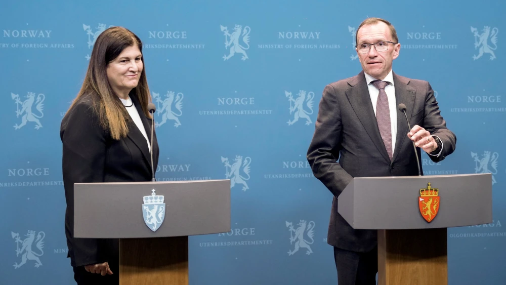 Norway's Foreign Minister Espen Barth Eide, right, a Palestinian Authority official, Varsen Aghabekian, adress a press conference at the Norwegian Foreign Office in Oslo, Norway on October 12, 2025. Photo by JAVAD PARSA/NTB/AFP via Getty Images.