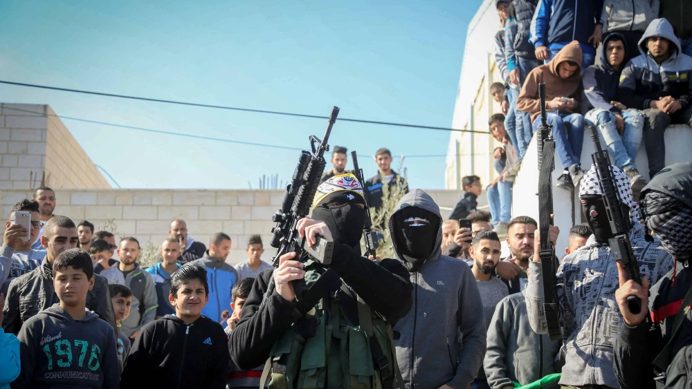 Palestinians carry the body of Bassel Mustafa Ibrahim during his funeral in the village of Anata, on the edge of Jerusalem Dec. 16, 2017. Photo by FLASH90.