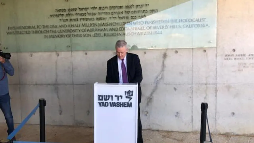 Rep. David Trone signing the guestbook at Yad Vashem. Credit: Congressman David Trone/Facebook.