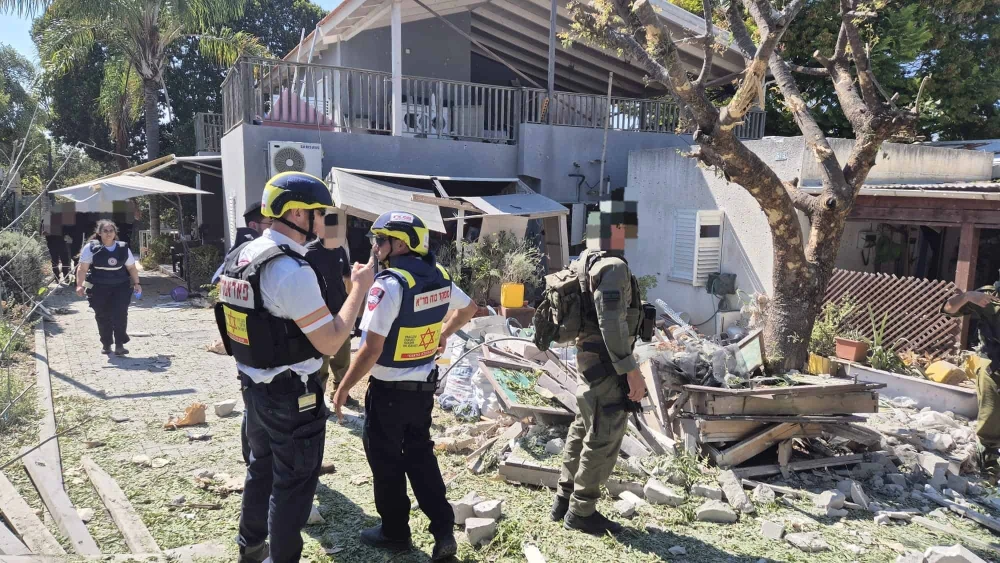 Emergency medical personnel and soldiers inspect the scene of a Hezbollah rocket strike in Kibbutz Sa'ar in northern Israel on Sept. 25, 2024. Credit: MDA.