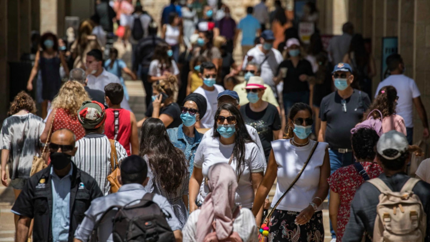 Jerusalemites walk and shop at the Mamilla Mall near Jerusalem's Old City on Aug. 10, 2020. Photo by Olivier Fitoussi/Flash90.