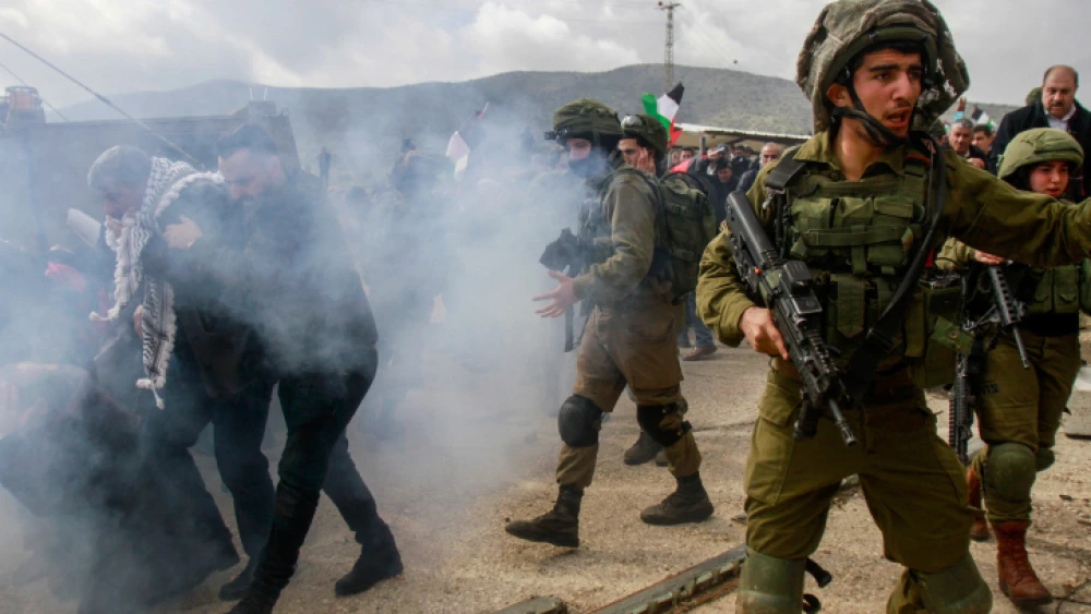 Palestinians clash with Israeli soldiers near the town of Tubas in Judea and Samaria, during a demonstration against U.S. President Donald Trump's peace proposal on on Jan. 29, 2020. Photo by Nasser Ishtayeh/Flash90.