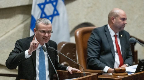Justice Minister Yariv Levin (left) addresses the Knesset during a debate on the government's judicial reform program, Feb. 20, 2023. Photo by Yonatan Sindel/Flash90.