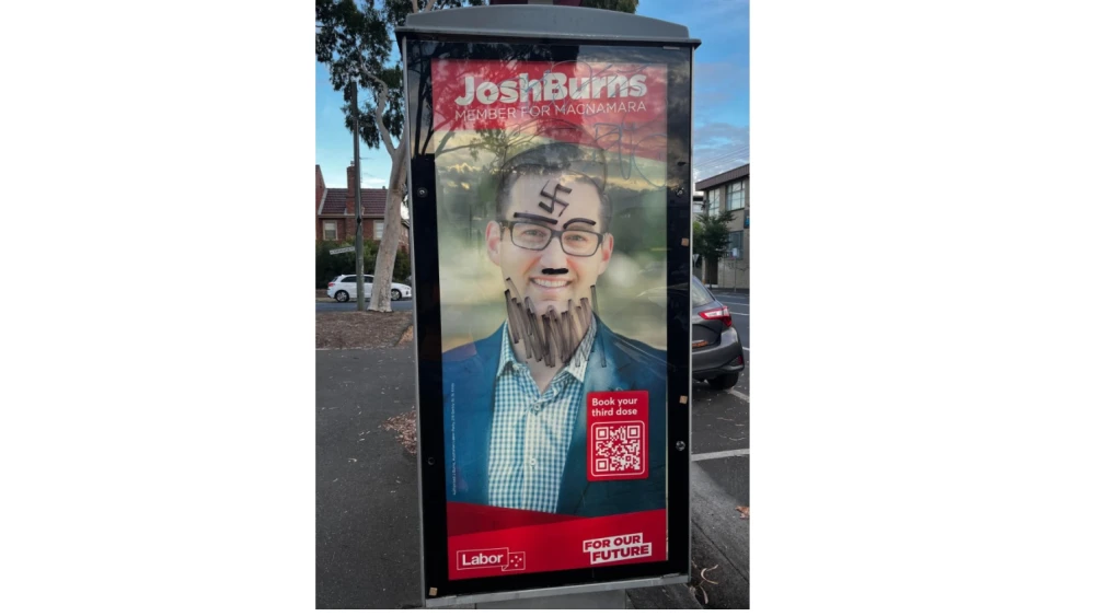 Australian MP Josh Burn campaign posted defaced by anti-Semitic graffiti. Source: Josh Burns/Twitter.