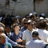 Lionel Messi (center) seen surrounded by press and security, as he and the FC Barcelona team arrive at the Western Wall in Jerusalem on Aug. 4, 2013. Photo by Miriam Alster/Flash90.