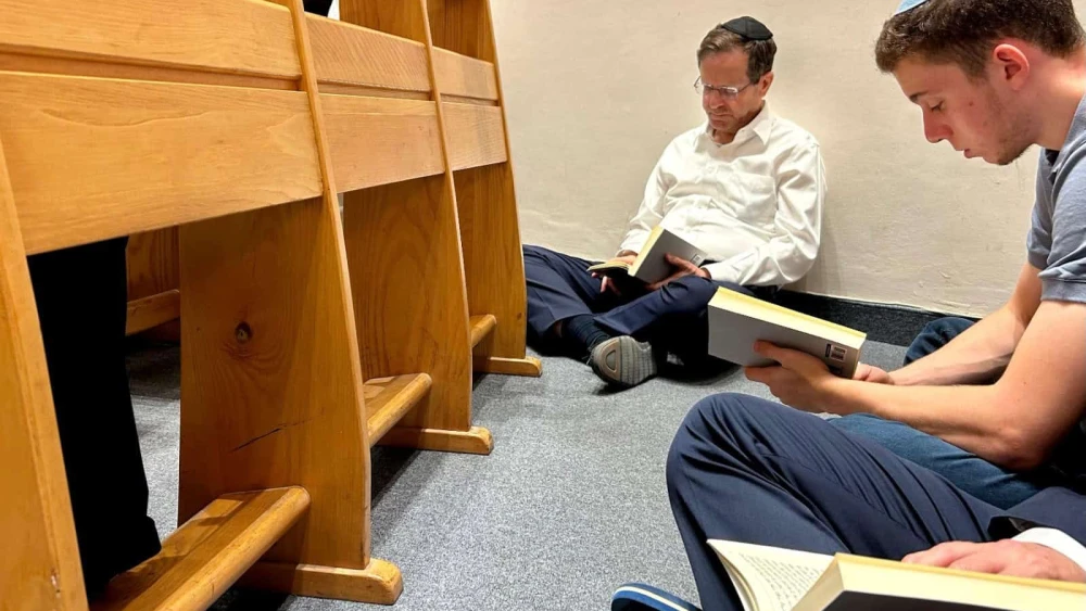 Israeli President Isaac Herzog participates in a reading of the book of Lamentations at the Ohel Nechama Synagogue in Jerusalem, July 13, 2024. Credit: Courtesy.