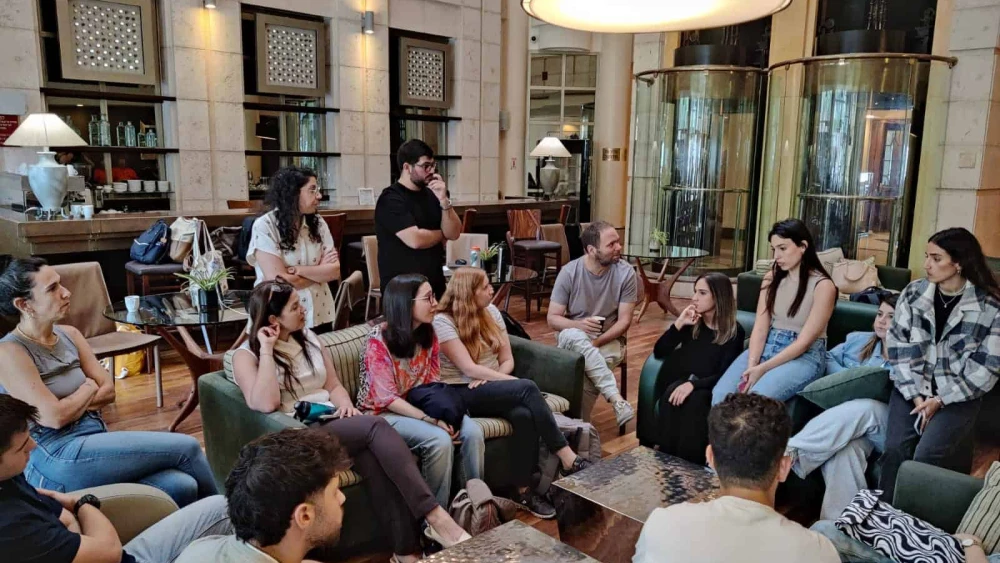 University of Haifa Law students attend a briefing with University lawyers at a hotel before the team began assisting evacuees in the early days of the war.(Courtesy)