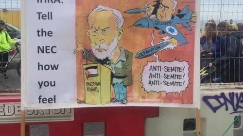 A poster outside of the British Labour Party conference alluding to Jeremy Corbyn. Credit: James Marlow.