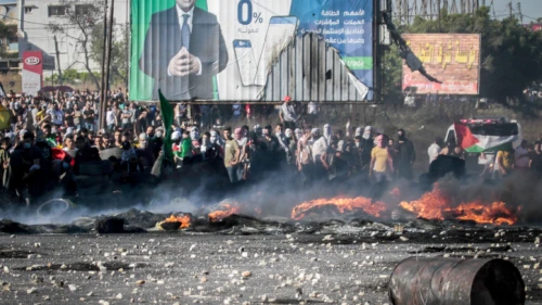 Palestinians clash with Israeli security forces near the Huwara checkpoint, south of Nablus, on May 18, 2021. Photo by Nasser Ishtayeh/Flash90.