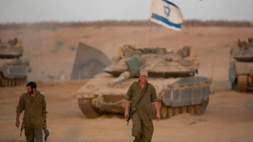 Israeli soldiers seen at a deployment area near the border with the Gaza Strip on Aug. 25, 2014. Photo by Yonatan Sindel/Flash90.