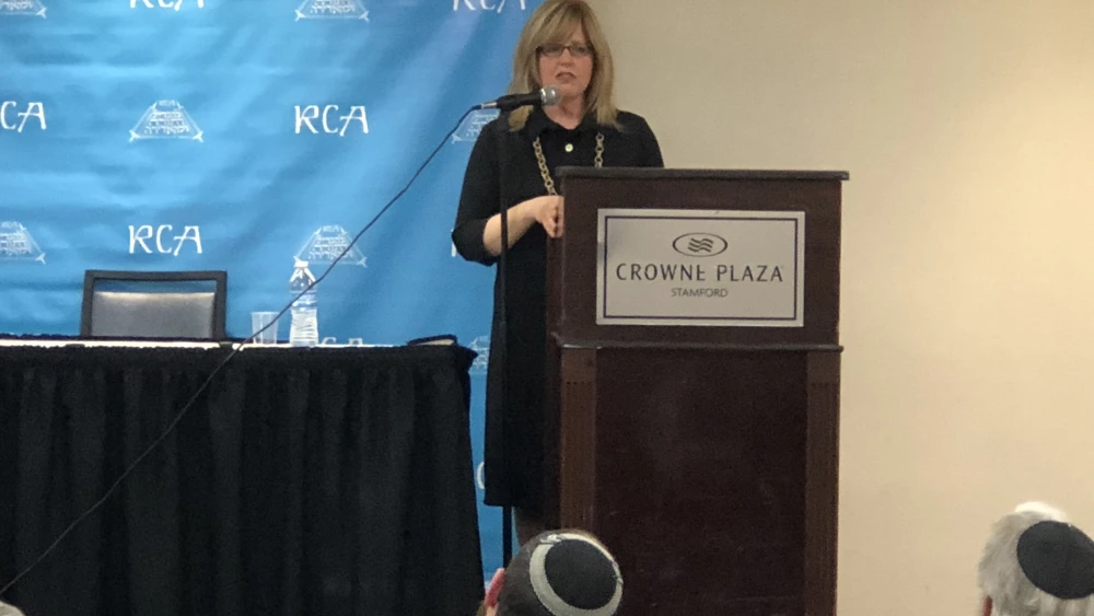 Adina Shmidman, Director of the OU’s department of women’s initiatives, speaking at the recent RCA (Rabbinical Council of America) convention. Credit: Adina Shmidman.
