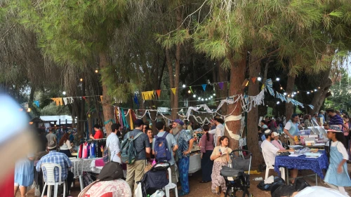 People taking part in the Moshav Fair during Sukkot in Moshav Mevo Modi’im, which was devstated by a wildfire in May 2019. Photo by: Deborah Fineblum.