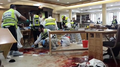 Israeli ZAKA first responders at the site on Nov. 18, 2014, where two Palestinian terrorists entered the Kehilat Yaakov synagogue in the Jewish neighborhood of Har Nof, Jerusalem, with pistols and axes, and began attacking worshippers. Five rabbis and a Druze police officer were murdered. Credit: ZAKA. Spokesperson.