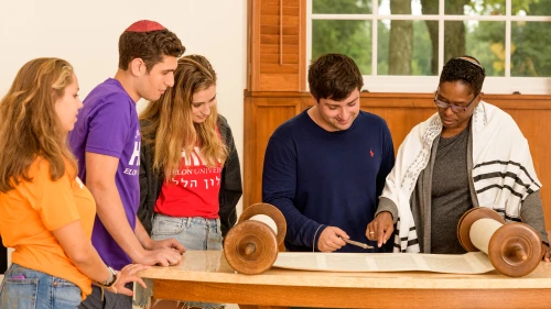 Students at Elon University in North Carolina read from the Torah. Credit: Elon University Hillel.