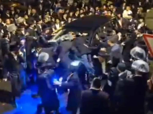 Haredim surround the car of Shas Party MK Yoav Ben-Tzur in Jerusalem, Nov. 15, 2025. Credit: Twitter/N12.
