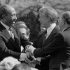 From left: Egyptian President Anwar Sadat, U.S. President Jimmy Carter and Israeli Prime Minister Menachem Begin at the White House for the signing of the 1979 Egypt-Israel peace treaty. A photo of the peace treaty's signing was added to the new edition of “The Geography of the Arab World and the History of Modern Egypt,” a ninth-grade Egyptian textbook. Credit: Warren K. Leffler via Wikimedia Commons.