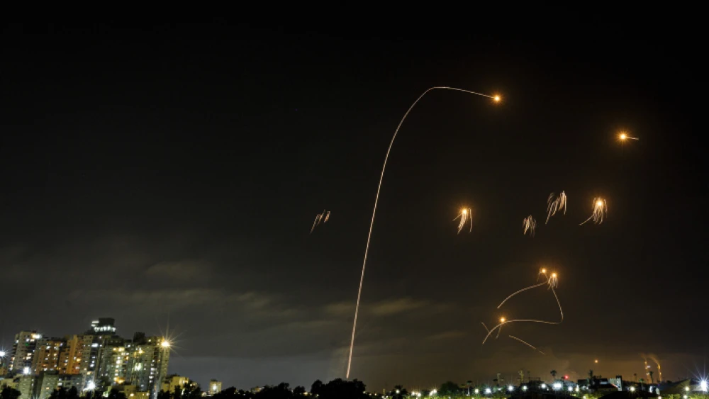 A long-exposure shot shows the Iron Dome air-defense system intercepting missiles launched from Hamas in the Gaza Strip towards Israel, as seen from the southern Israeli city of Ashkelon, on May 10, 2021. Photo by Edi Israel/Flash90.