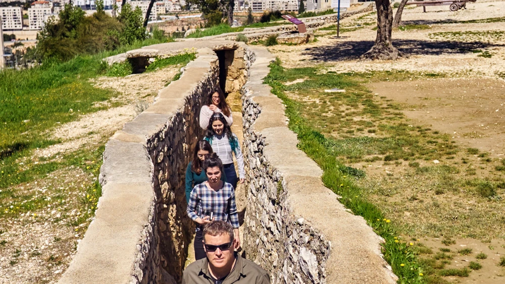 Students tour the Ammunition Hill heritage site, preserved by Jewish National Fund-USA and featured in OpenDor Media’s Israel Heritage Sites Unpacked series