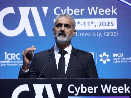 Yossi Karadi, director general of the Israel National Cyber Directorate, addresses the CyberWeek 2025 conference in Tel Aviv, Dec. 9, 2025. Credit: INCD.