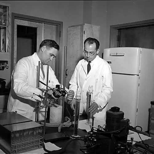 Dr. Jonas Salk with Percival (Val) Bazeley, one of the polio team's senior scientists circa 1954/1955. Credit: University of Pittsburgh Historic Photographs.