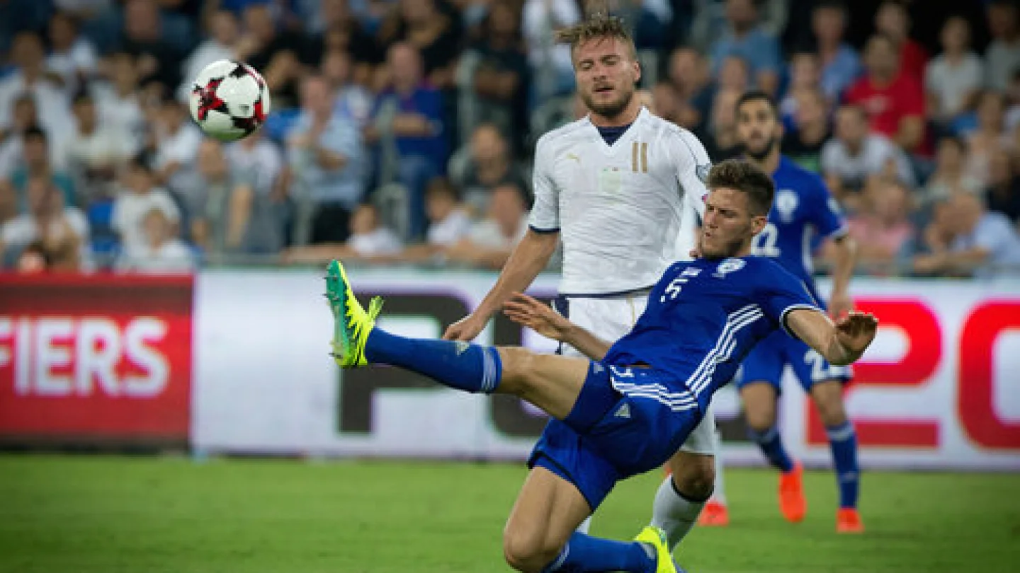 A FIFA World Cup qualifier match between Israel (blue uniform) and Italy at the Sami Ofer stadium in Haifa on Sept. 5, 2016. Credit: Yonatan Sindel/Flash90.
