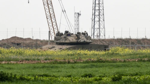 An Israeli Merkava tank seen on the Israeli-Gaza border after Israeli forces killed Jihad Islamic militants while trying to place a bomb along the boder with Israel, east of Rafah, in the southern Gaza Strip, Feb. 23, 2020. Photo by Fadi Fahd/Flash90.