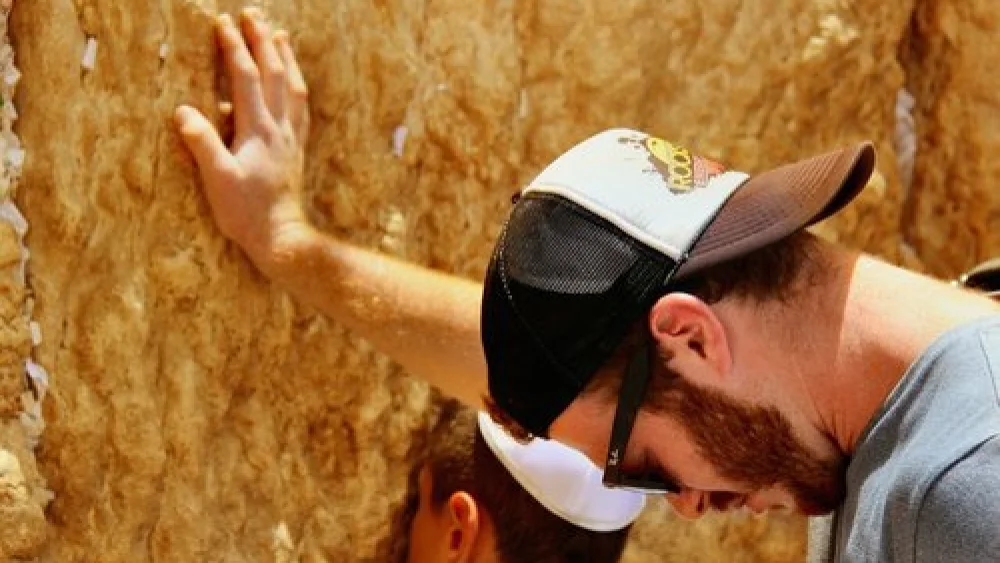 A Covenant Journey participant at the Western Wall in Jerusalem. Credit: Liberty Counsel.