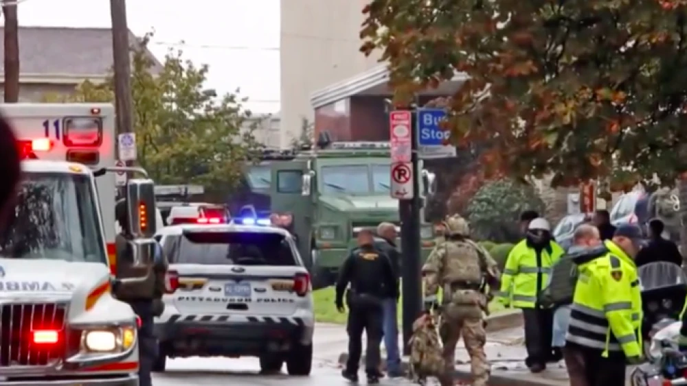Emergency personnel on the scene after a gunman killed 11 people and injured four others at the Tree of Life*Or L’Simcha Synagogue in Pittsburgh on Oct. 27, 2018. Source: Screenshot.