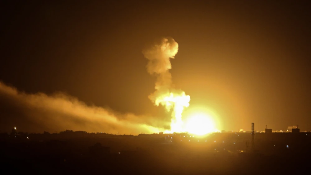 A ball of fire and smoke rises above buildings during Israeli airstrikes in Khan Yunis in the southern Gaza Strip on Feb. 24, 2020. Photo by Fadi Fahd/Flash90.