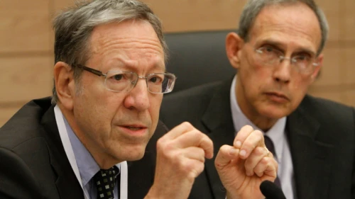 Canadian MP Irwin Cotler (left), an international law expert, speaks at a Knesset Foreign Affairs and Defense Committee meeting in Jerusalem alongside MK Nachman Shai on March 20, 2012. Photo by Miriam Alster/Flash90.