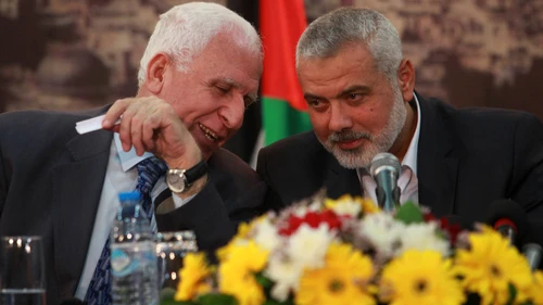 File photo: Head of the Hamas government Ismail Haniyeh (right) and senior Fatah official Azzam Al-Ahmed at a news conference in Gaza City. Credit: Abed Rahim Khatib/Flash90.
