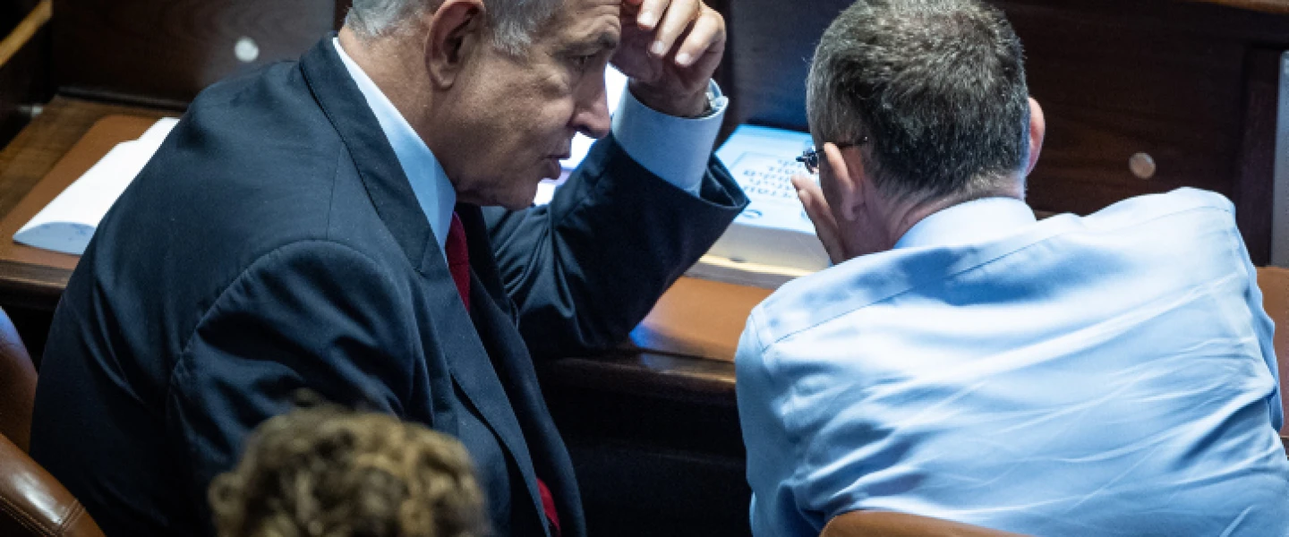 Likud Party chairman MK Benjamin Netanyahu with Likud MK Yariv Levin in the Knesset assembly hall on Nov. 21, 2022. Photo by Yonatan Sindel/Flash90.