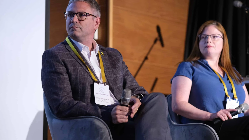 Tel Aviv University’s Hay Eytan Cohen Yanarocak and Dina Lisnyansky participate in a panel discussion at Kibbutz Lohamei Hageta’ot in the Western Galilee on May 21, 2025. Credit: Courtesy of the Alma Center.