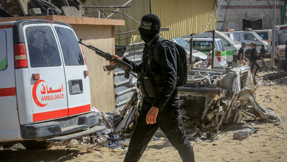 A masked member of Hamas in the southern Gaza Strip. Credit: Saeed Mohammed/Flash90.