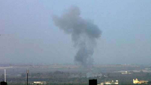 Smoke billows on the Egyptian side of the border, seen from Rafah in southern Gaza, following an explosion on Feb. 10, 2018. Egypt closed its border with the Gaza Strip, Palestinian officials said, after Cairo launched a major operation against jihadists in the Sinai Peninsula. Photo by Abed Rahim Khatib.