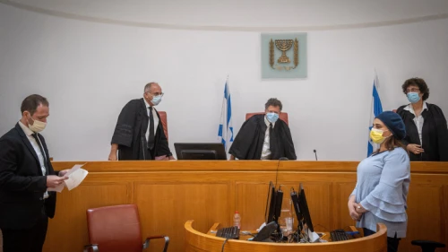 Israeli Supreme Court justice Yitzhak Amit (center) attends a hearing regarding the evacuation of Arab families from their home in Jerusalem's Sheikh Jarrah neighborhood, on Aug. 2, 2021. Photo by Yonatan Sindel/Flash90.