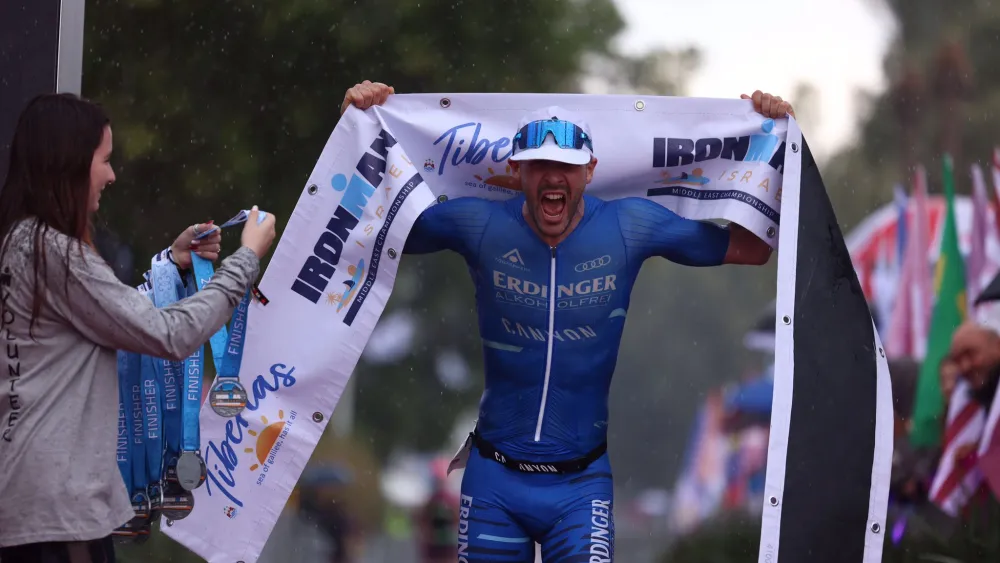 Patrick Lange of Germany won the title of "IRONMAN Israel-Middle East Champion," Nov. 25, 2022. Photo by Gilad Kavalerchik, Ronen Topelberg.