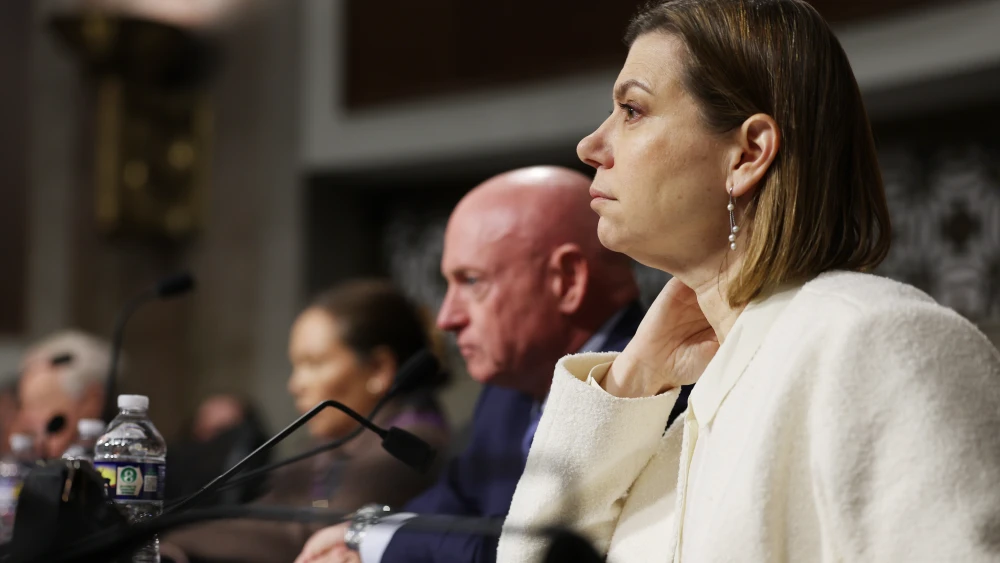Sens. Elissa Slotkin (D-Mich.) and Mark Kelly (D-Ariz.) look on during a hearing with the Senate Armed Services Committee at the Dirksen Senate Office Building in Washington, D.C., on March 12, 2026. Photo by Anna Moneymaker/Getty Images.