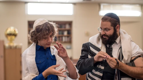 Rabbi Yehoshua Soudakoff, executive director of the Jewish Deaf Foundation (JDF) and director of Chabad of the Deaf Community in Israel, working with a student. Courtesy.