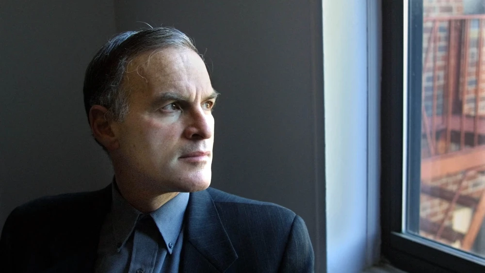 Professor and author Norman Finkelstein in his apartment in Brooklyn, N.Y., on Feb. 18, 2001. His controversial book Industry of the Holocaust attacks American Jewish organizations, claiming that they exploit Holocaust survivors. Photo by Matt Campbell/AFP via Getty Images.