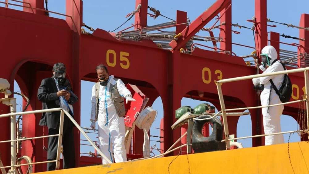 Workers inspect the aftermath of a deadly chlorine gas leak at the port of Aqaba in Jordan on June 27, 2022. Photo: Ameer Khalifeh/Jordan News.