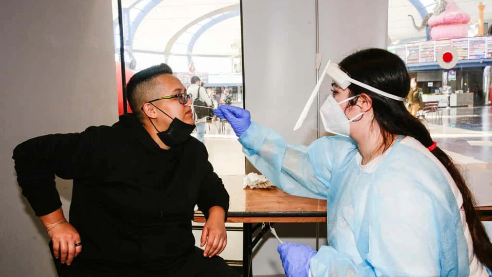 A nurse collects a swab sample from at a coronavirus testing center in Jerusalem, Jan. 6, 2022. Photo by Shalev Shalom/TPS.