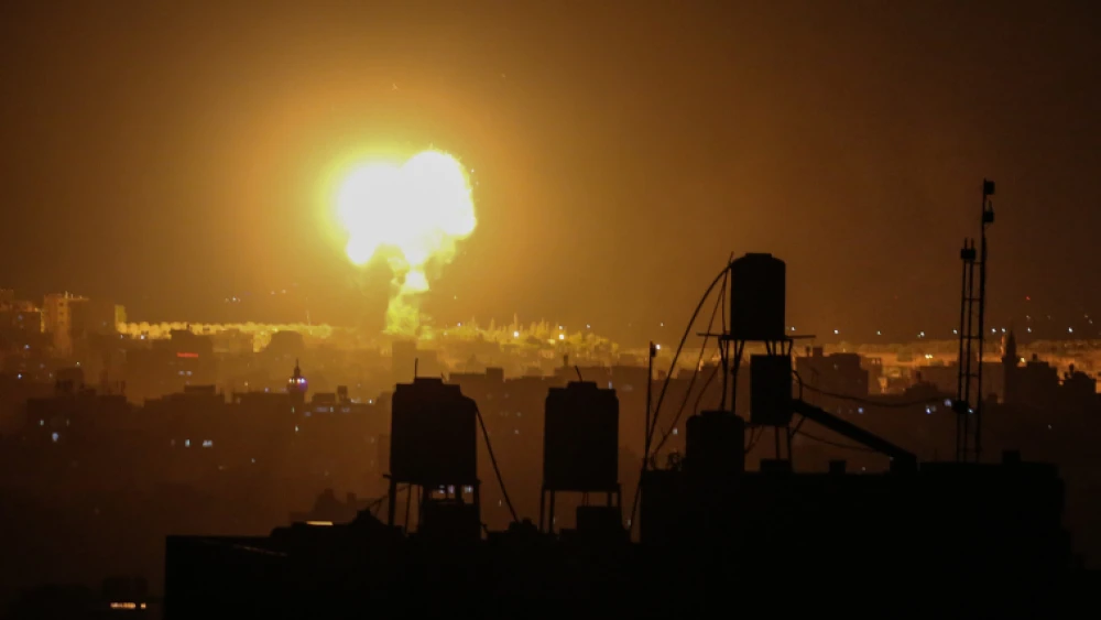 Smoke and flames rise after an Israeli airstrike on a Hamas target in the northern Gaza Strip, June 18, 2021. Photo by Atia Mohammed/Flash90.