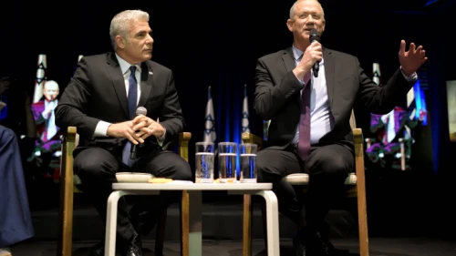 Israeli Defense Minister Benny Gantz and soon-to-be Foreign Minister Yair Lapid at a Tel Aviv International Salon election event, Feb. 17, 2020. Photo by Gili Yaari/Flash90.