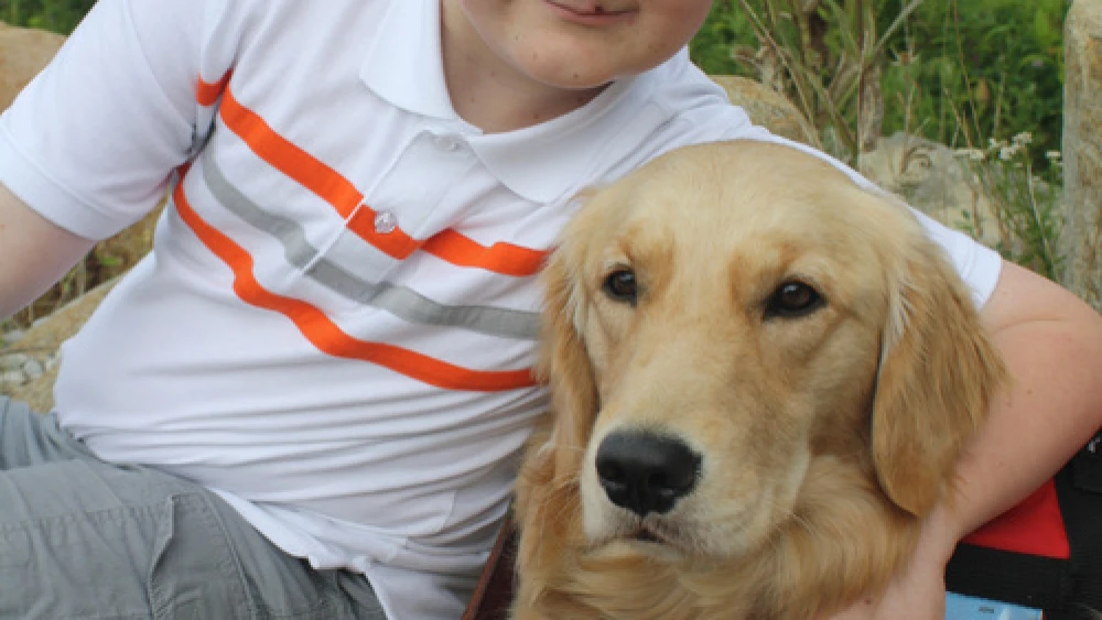 William (Baruch Nissan) Snyder with his special dog, Asha. Credit: Courtesy Snyder family.